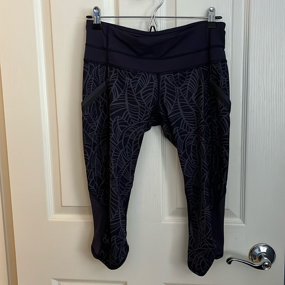 Lululemon leaf-print purple capri pants. Size 6.